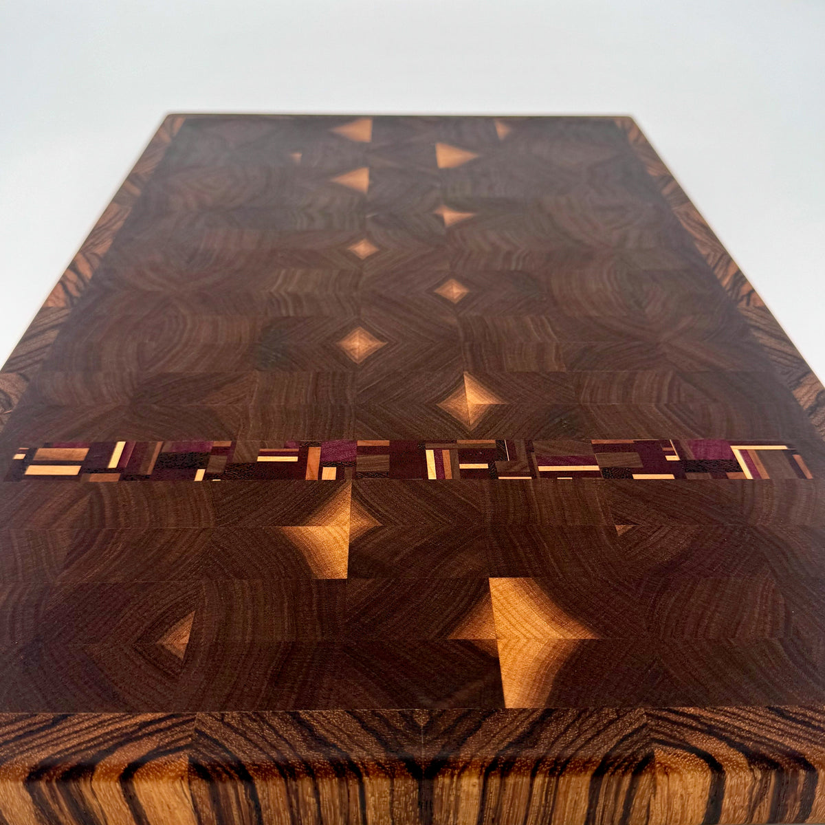 Bluegrass Noir | Black Walnutdf w/Chaos Strip, Zebrawood Border End Grain Cutting and Serving Board